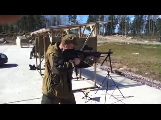 shooting from a machine gun pecheneg bullpup