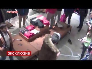 in moscow, a visitor beat a saleswoman for refusing to take off his sneakers